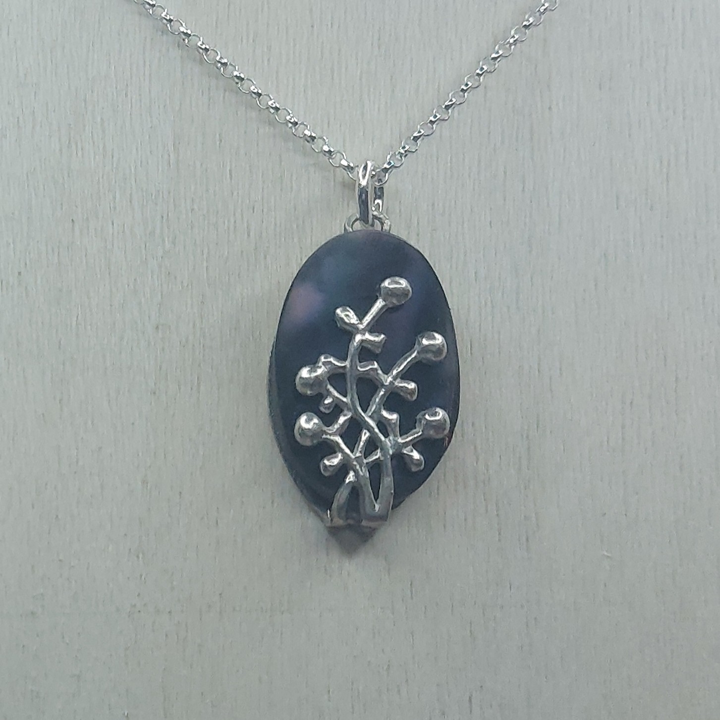 Black Lip Shell & Sterling Silver Ornate Oval Pendant